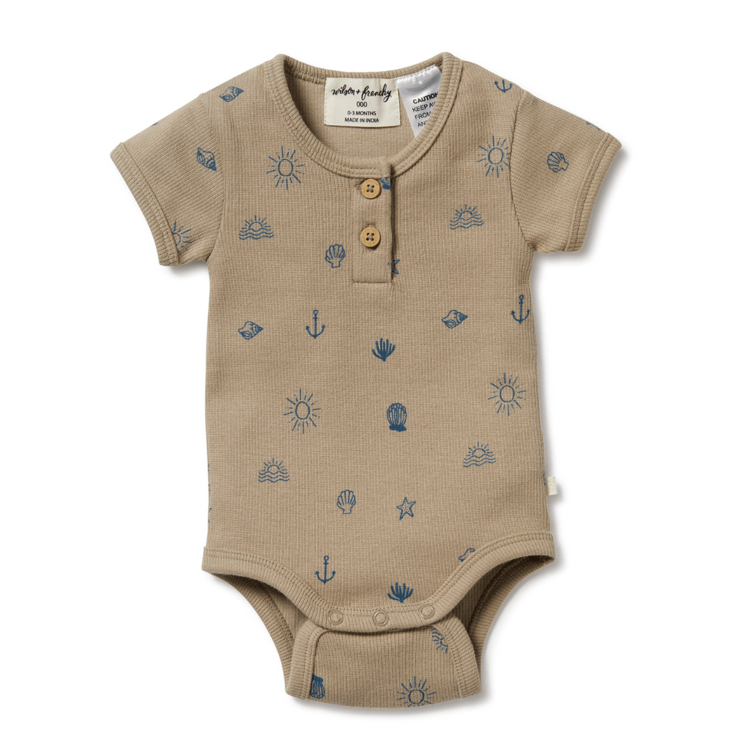 A Wilson & Frenchy Organic Rib Henley Onesie with anchors and stars.