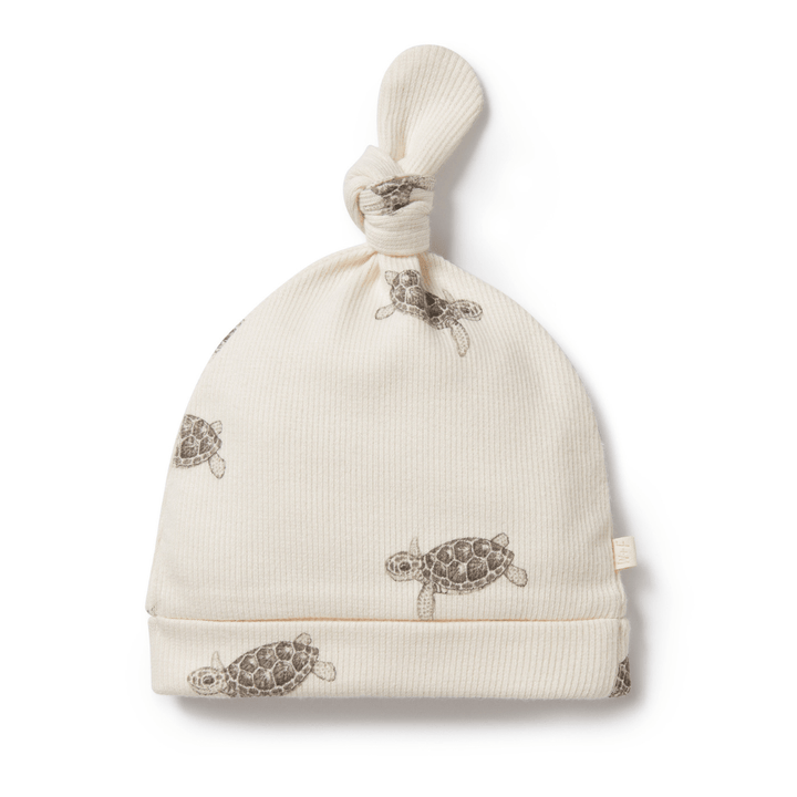 An Wilson & Frenchy Organic Rib Knot Hat with turtles on it by Wilson & Frenchy.