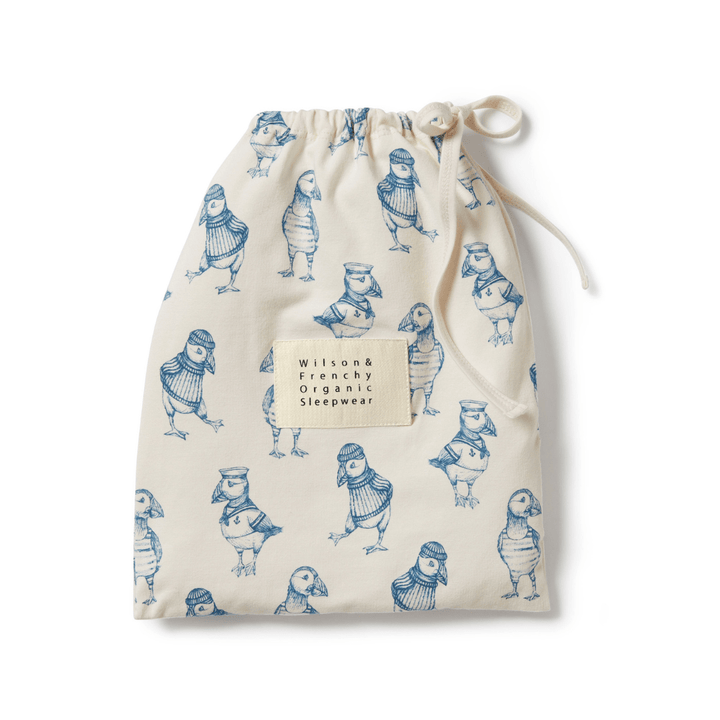A Wilson & Frenchy reusable bag made of organic cotton with birds on it.