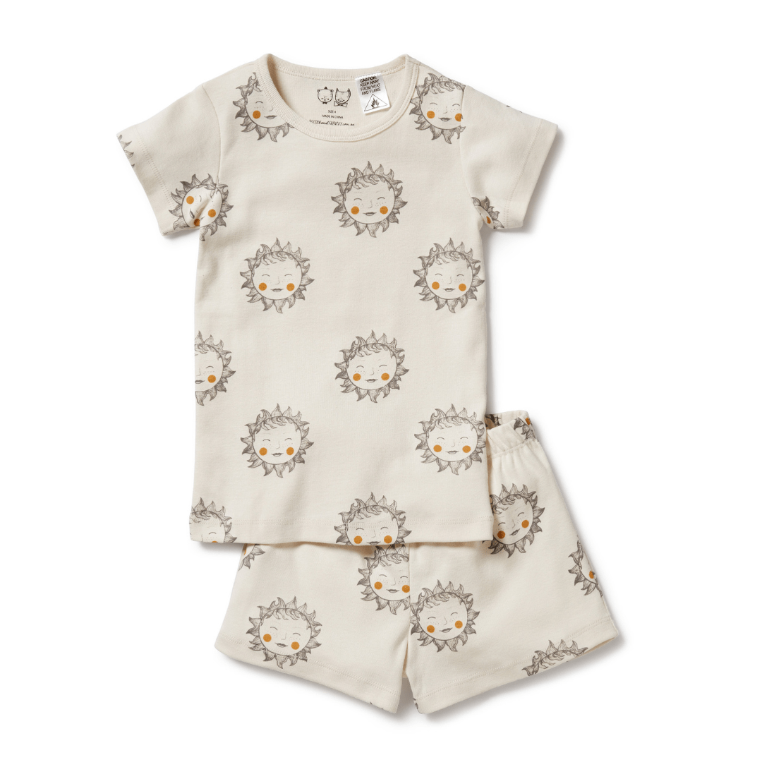 A Wilson & Frenchy Organic Short Sleeve Pyjamas - LUCKY LAST - SHINE ON ME - 1 YEAR ONLY baby sleepwear set with a sun on it, delivered in a reusable bag.