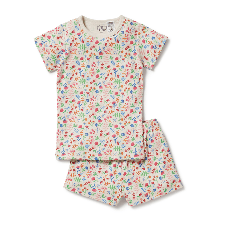 A Wilson & Frenchy Organic Short Sleeve Pyjama set made of organic cotton, with flowers on it.