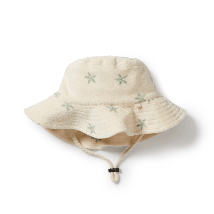 A Wilson & Frenchy Organic Terry Kids Sunhat with stars on it.