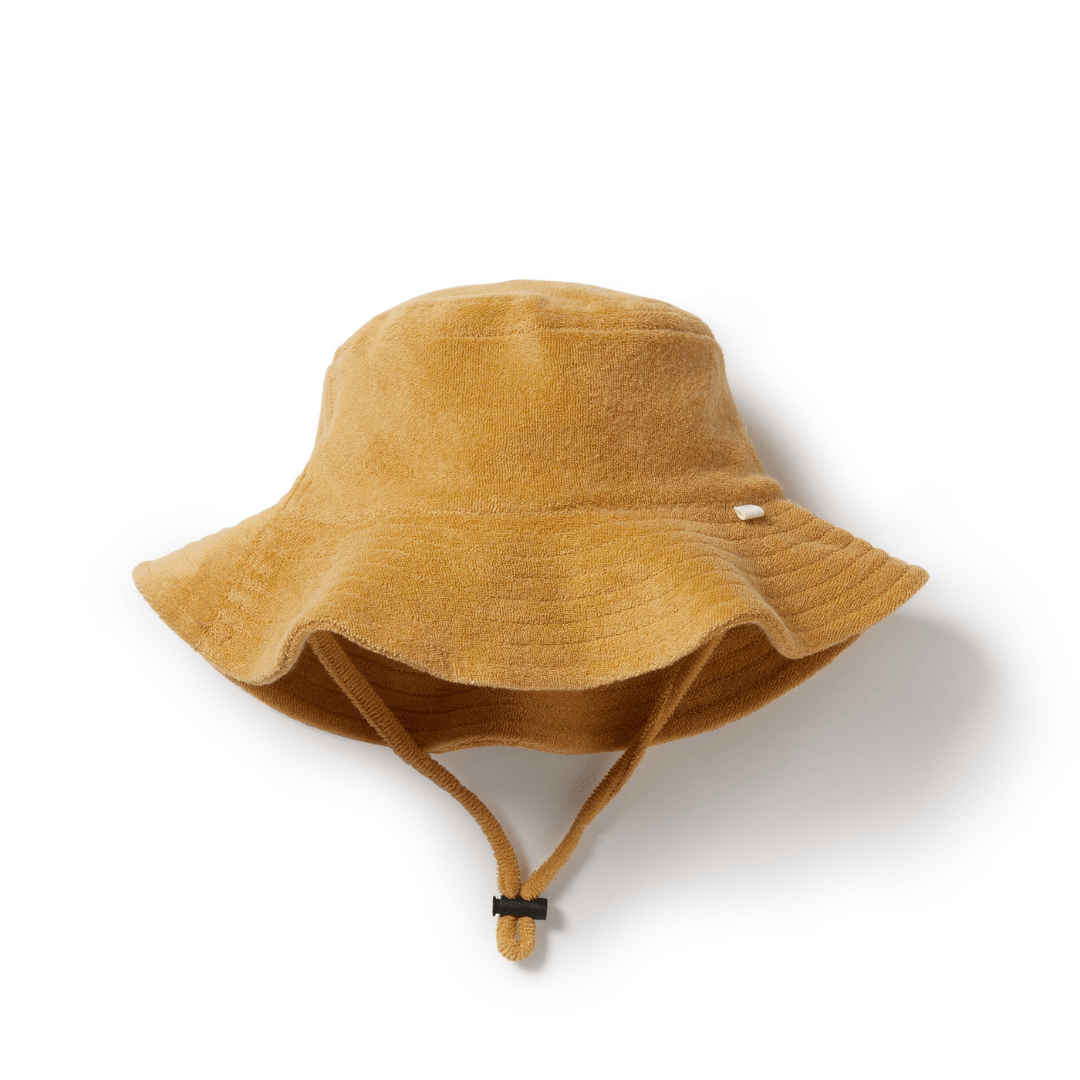 A Wilson & Frenchy Organic Terry Sunhat in LUCKY LAST SUN DIAL for 6-12 months on a white background.