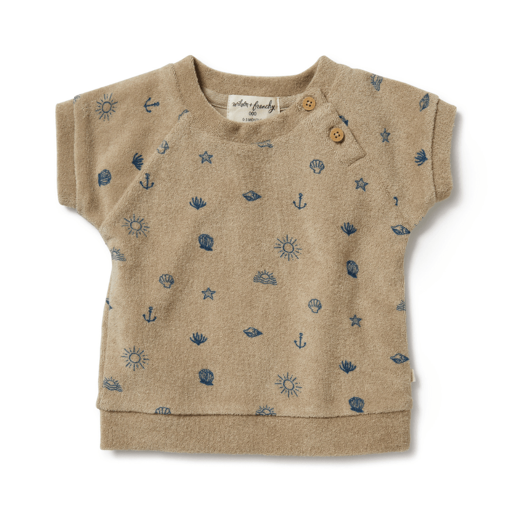 A Wilson & Frenchy Organic Terry Sweat Top made of 100% organic cotton, featuring stars and anchors.