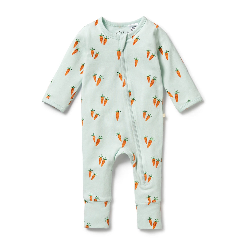 A Wilson & Frenchy Organic Baby Easter Pyjamas with carrots on it, perfect for snuggle time.