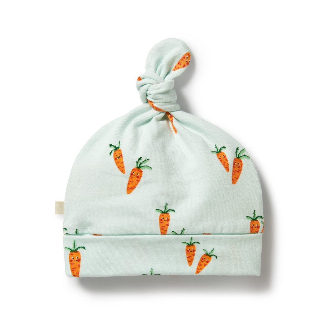 Wilson & Frenchy Organic Easter Knot Hat - LUCKY LASTS - CUTE CARROTS ONLY with carrot print on a white background, featuring an adjustable knot.
