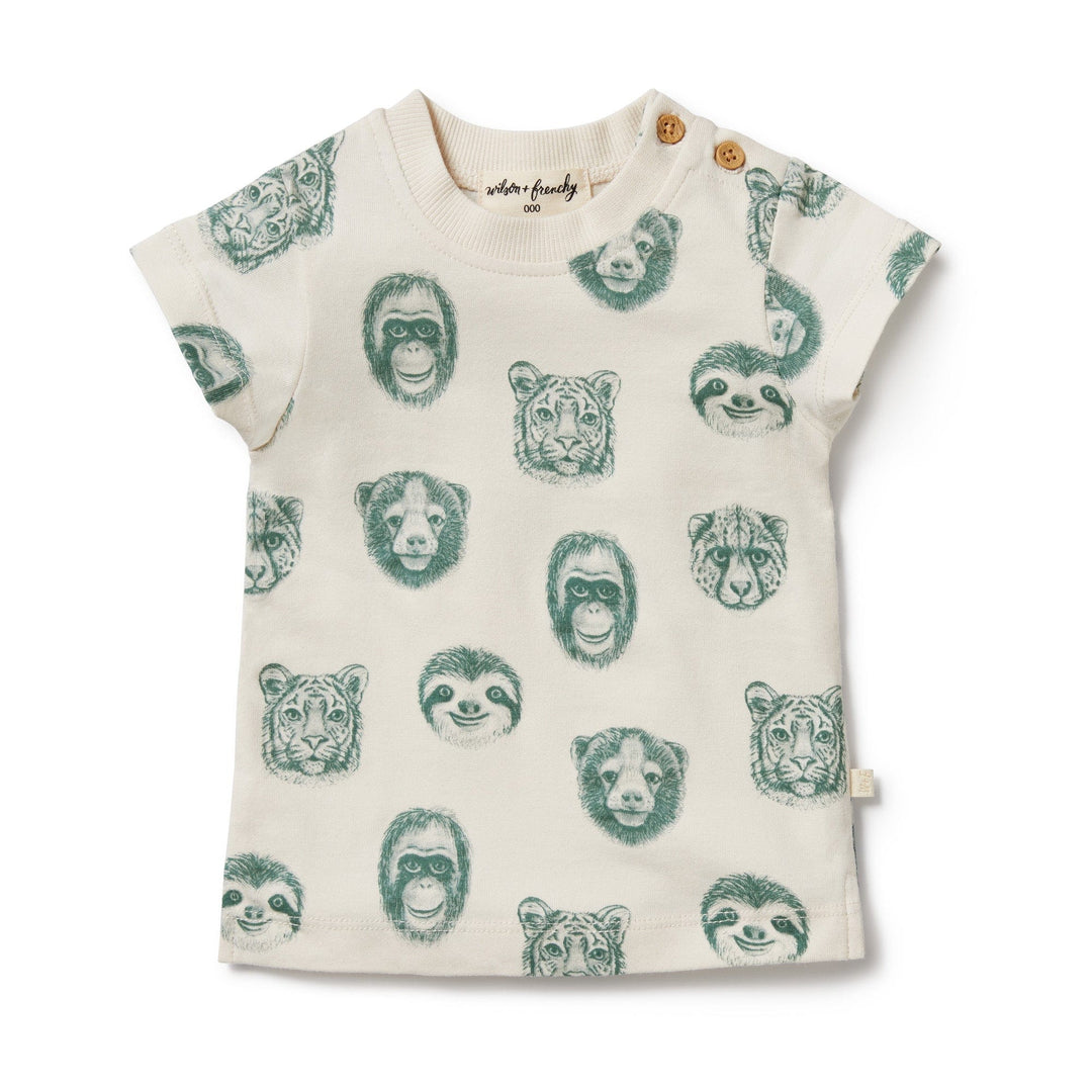 A Wilson & Frenchy Organic Tee - LUCKY LAST - HELLO JUNGLE - 0-3 MONTHS ONLY with monkeys and sloths on it, featuring a side-neck button opening for easy dressing. This soft and breathable baby t-shirt is perfect for keeping your little one comfortable all day.