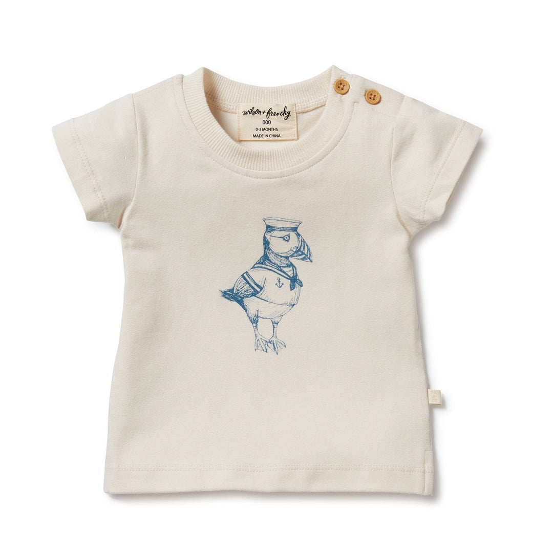 A white short-sleeved tee made from organic cotton blend, featuring a Wilson & Frenchy Puffin Organic Tee design.
