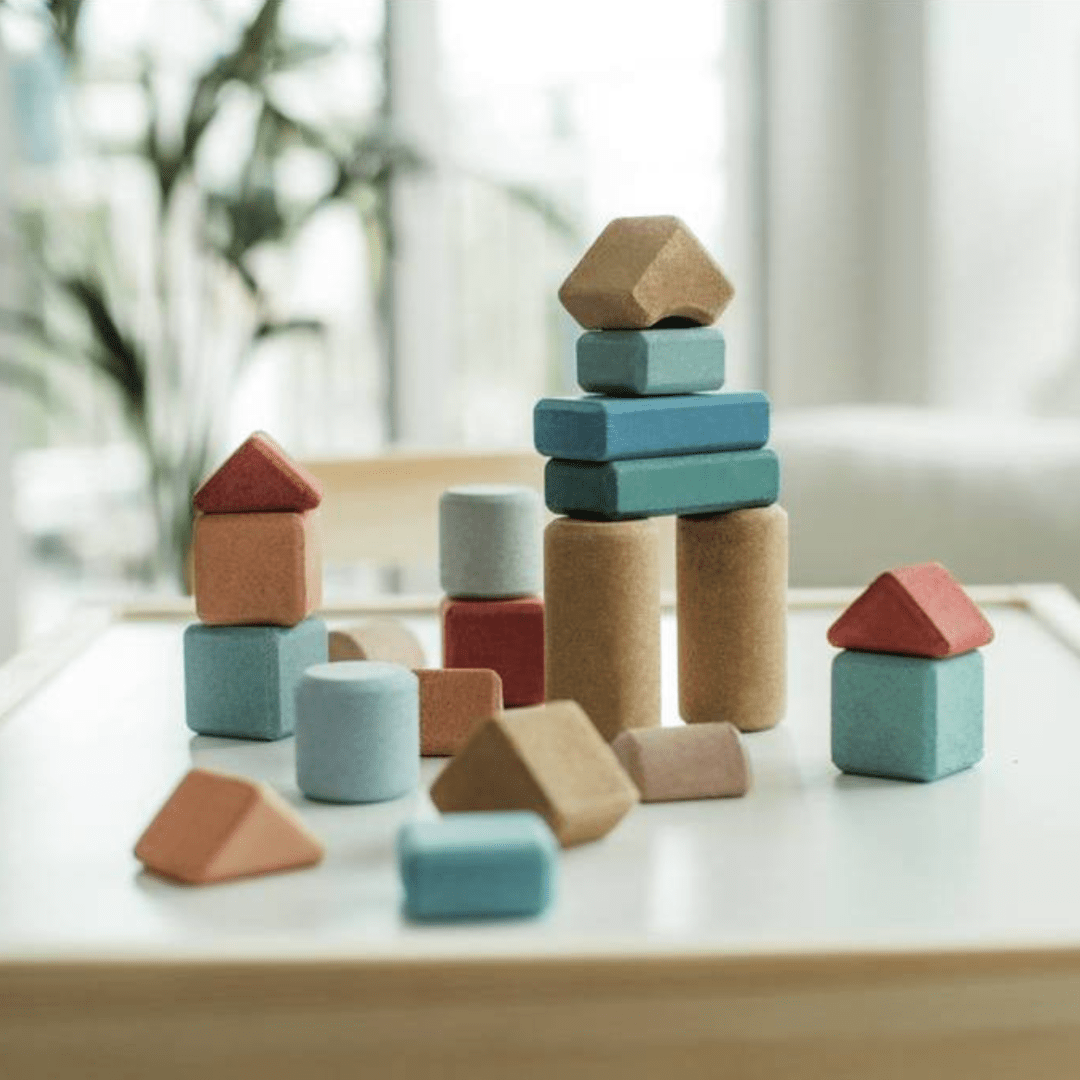 An eco-friendly Korko Block Set arranged on a table with natural light streaming through the window.