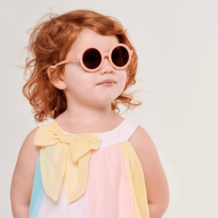 Adorable-Little-Girl-Wearing-Babiators-Euro-Roound-Baby-Kids-Sunglasses-Peachy-Keen-Naked-Baby-Eco-Boutique
