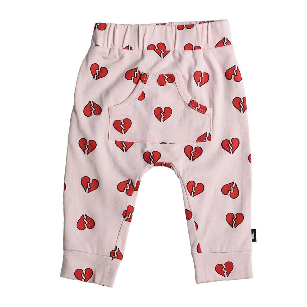 A pair of Anarkid Organic Cotton Heartbreaker Baggies with hearts on them made from organic cotton.