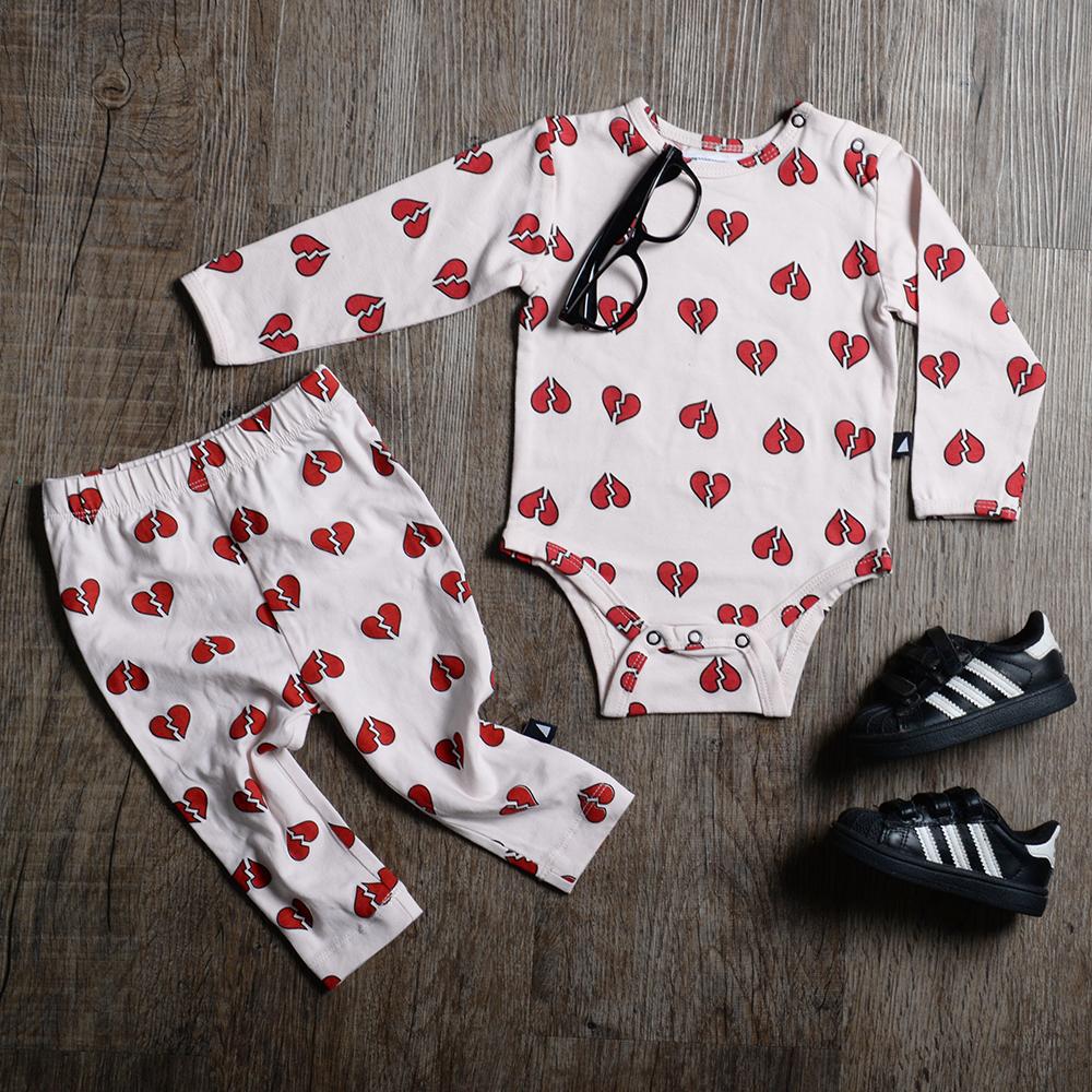 A high quality baby outfit made with Anarkid's Organic Cotton Pink Heartbreaker Leggings - LUCKY LAST - 0-3 MONTHS.