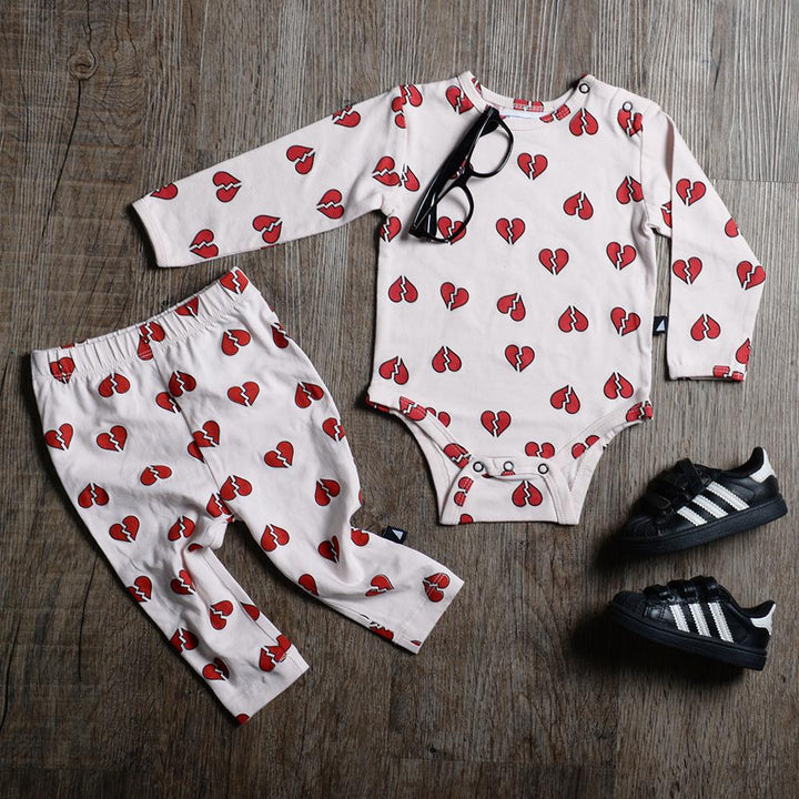 A high quality baby outfit made with Anarkid's Organic Cotton Pink Heartbreaker Leggings - LUCKY LAST - 0-3 MONTHS.