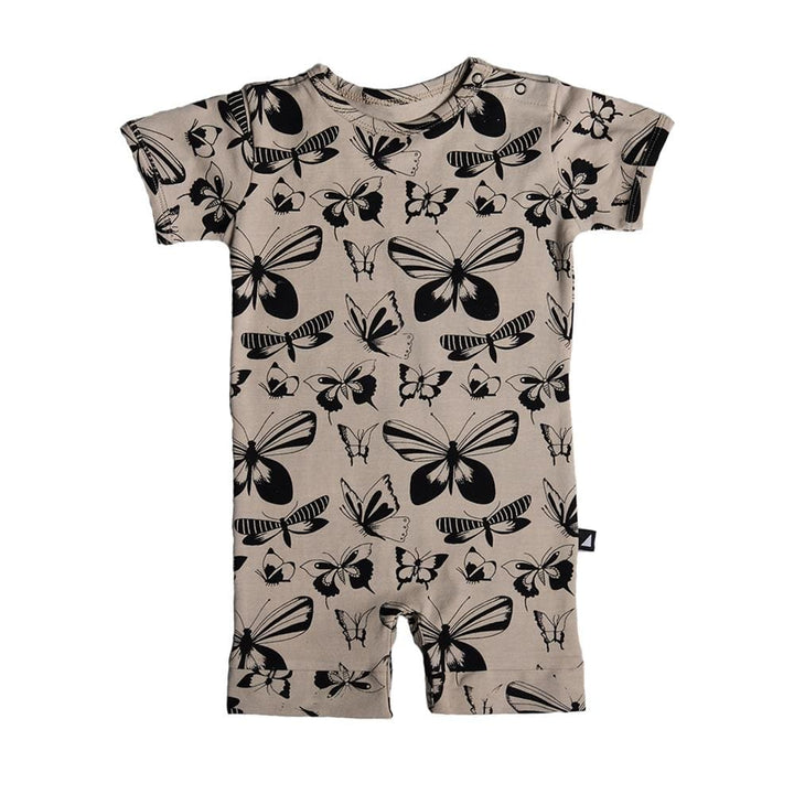 An Anarkid Organic Cotton Short-Sleeve Romper (Multiple Variants) with black and white butterflies on it.