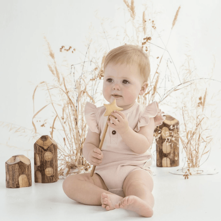Aster-And-Oak-Organic-Peach-Rib-Ruffle-Onesie-On-Little-Baby-Naked-Baby-Eco-Boutique