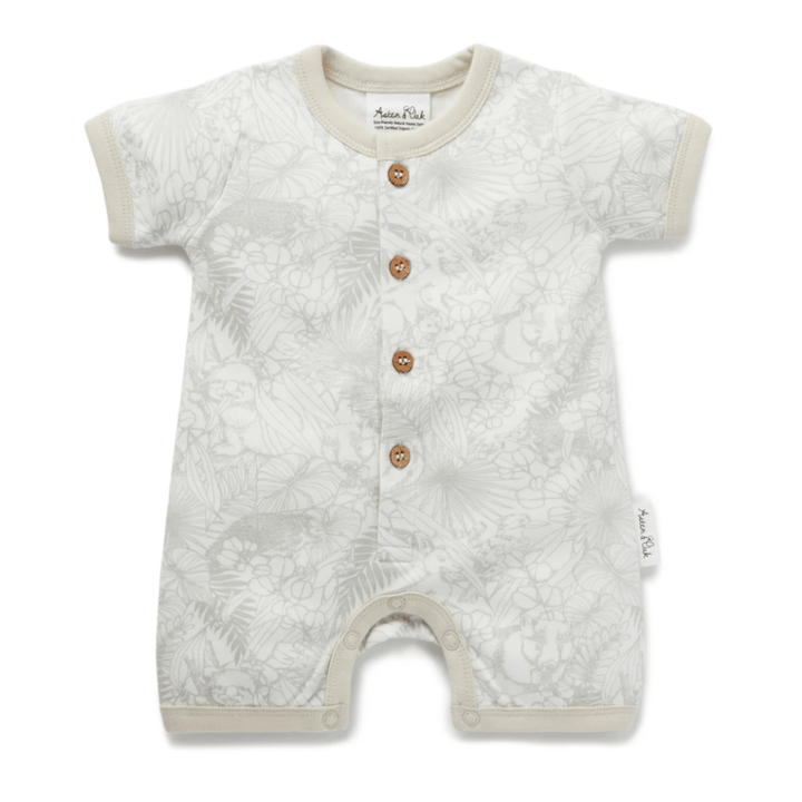 An Aster & Oak Organic Animal Button Romper - LUCKY LASTS - NEWBORN made of organic cotton with buttons and a floral print.