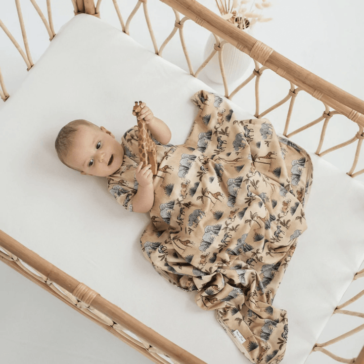 Baby-In-Cot-Wearing-Aster-And-Oak-Organic-Cotton-Zip-Romper-Safari-Naked-Baby-Eco-Boutique