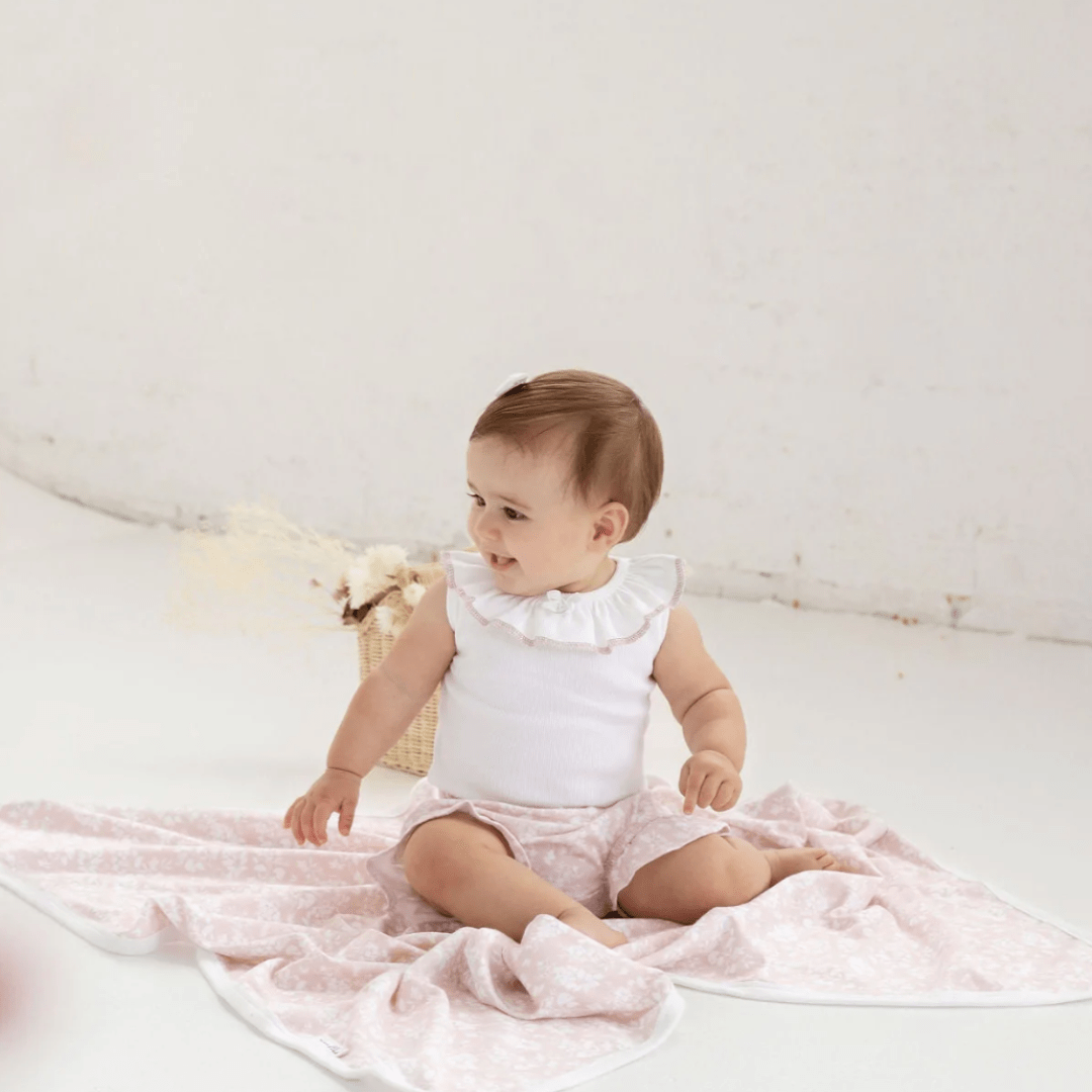 Baby-Sitting-Smiling-Wearing-Aster-and-Oak-Organic-Ruffle-Bloomers-Pink-Floral-Naked-Baby-Eco-Boutique