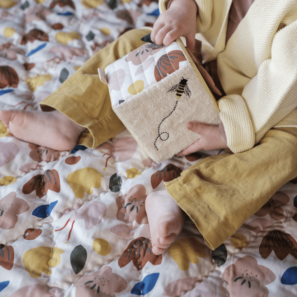 Baby-Sitting-on-Flower-Quilt-Playing-with-Fabelab-Organic-Cotton-Fabric-Cube-Naked-Baby-Eco-Boutique