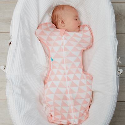 Baby-Sleeping-in-Bassinet-Wearing-Close-up-of-Baby-in-Baby-in-Cot-Wearing-Love-to-Dream-Bamboo-Swaddle-Up-Lite-Coral-Naked-Baby-Eco-Boutique