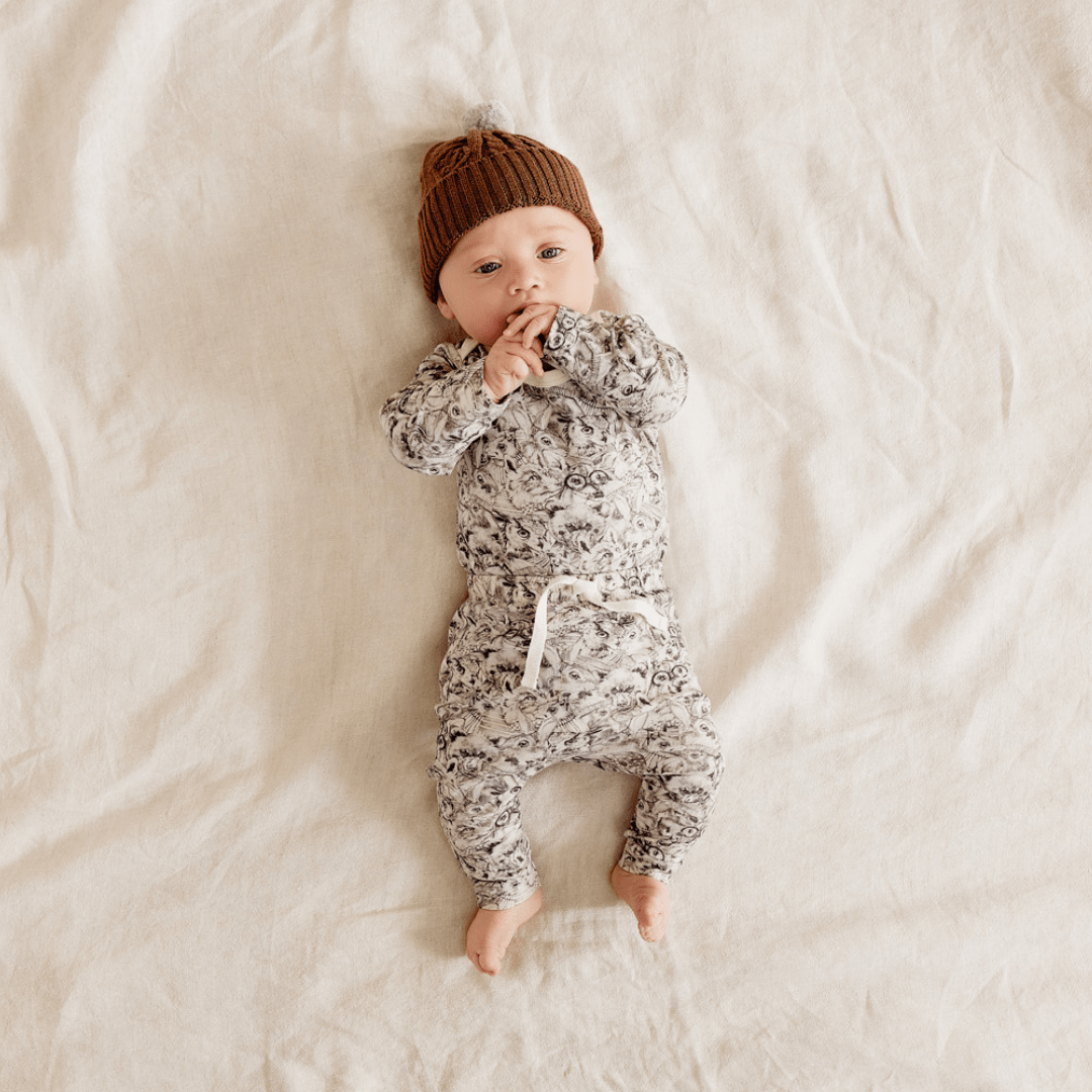 Baby-Sucking-Hand-Wearing-Wilson-and-Frenchy-Organic-Cotton-Envelope-Onesie-Forest-Animals-Naked-Baby-Eco-Boutique