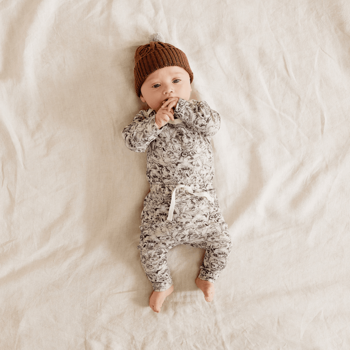 Baby-Sucking-Hand-Wearing-Wilson-and-Frenchy-Organic-Cotton-Envelope-Onesie-Forest-Animals-Naked-Baby-Eco-Boutique