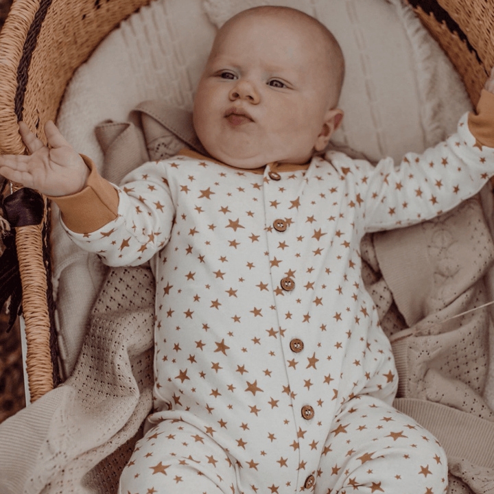 Baby-Wearing-Aster-and-Oak-Organic-Cotton-Button-Romper-Taffy-Star-Naked-Baby-Eco-Boutique