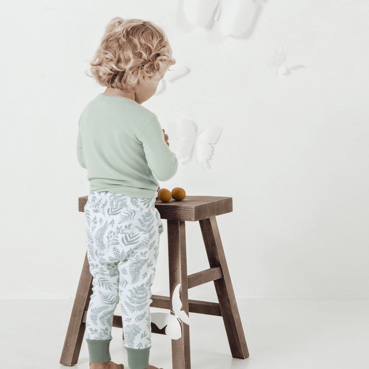 Back-View-of-Child-Wearing-Aster-and-Oak-Organic-Cotton-Harem-Pants-Fern-Naked-Baby-Eco-Boutique