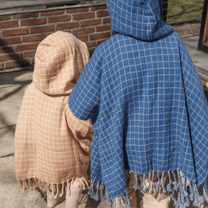 Back-View-of-Fabelab-Organic-Cotton-Grid-Kids-Poncho-Naked-Baby-Eco-Boutique
