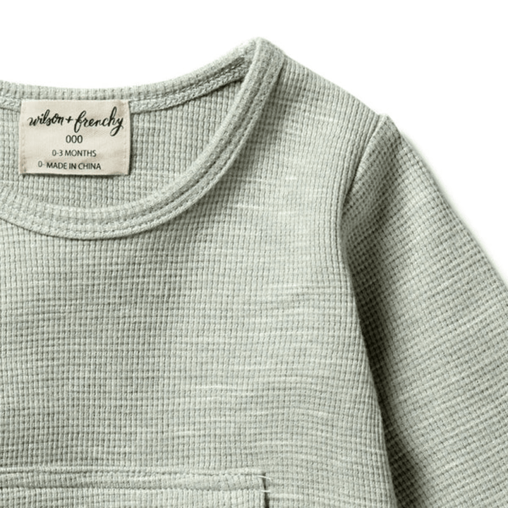 Close-Up-Of-Neckline-On-Wilson-And-Frenchy-Organic-Waffle-Pocket-Top-Sage-Naked-Baby-Eco-Boutique