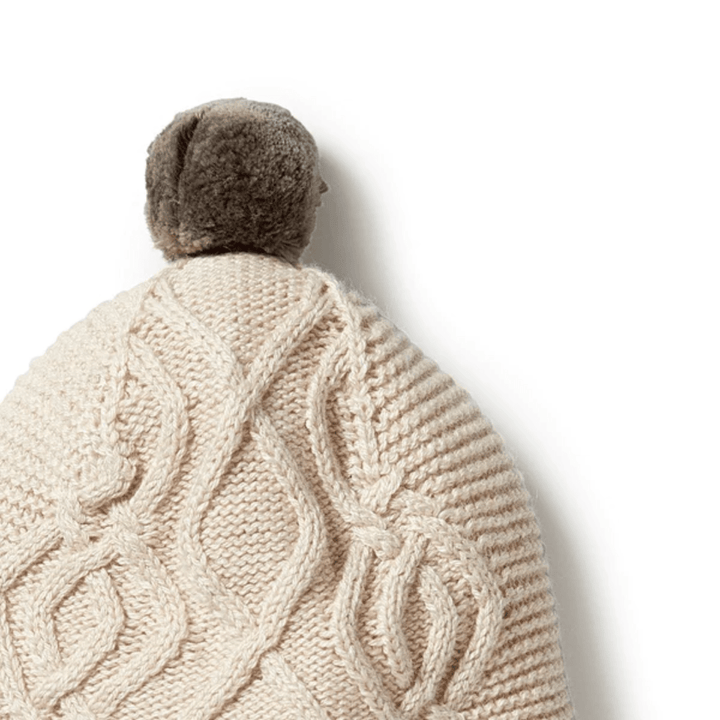 Close-Up-Of-Wilson-And-Frenchy-Knitted-Cable-Bonnet-Oatmeal-Melange-Naked-Baby-Eco-Boutique