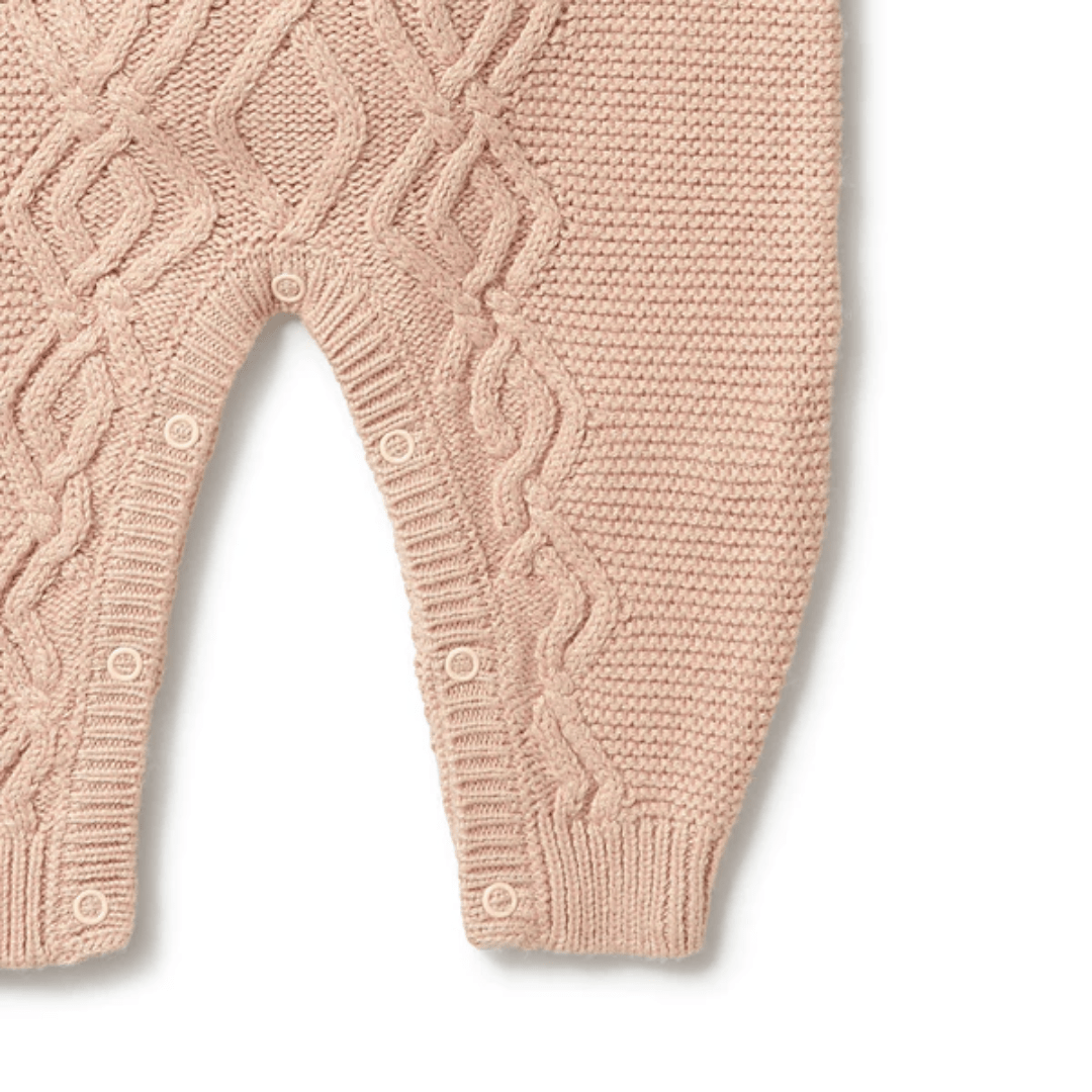Close-Up-Of-Wilson-And-Frenchy-Knitted-Cable-Growsuit-Rose-Naked-Baby-Eco-Boutique