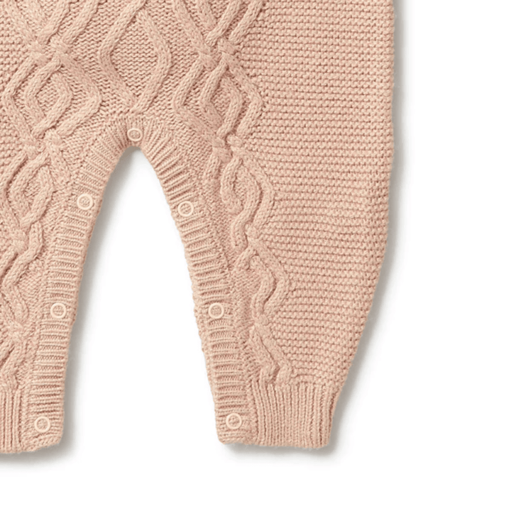 Close-Up-Of-Wilson-And-Frenchy-Knitted-Cable-Growsuit-Rose-Naked-Baby-Eco-Boutique