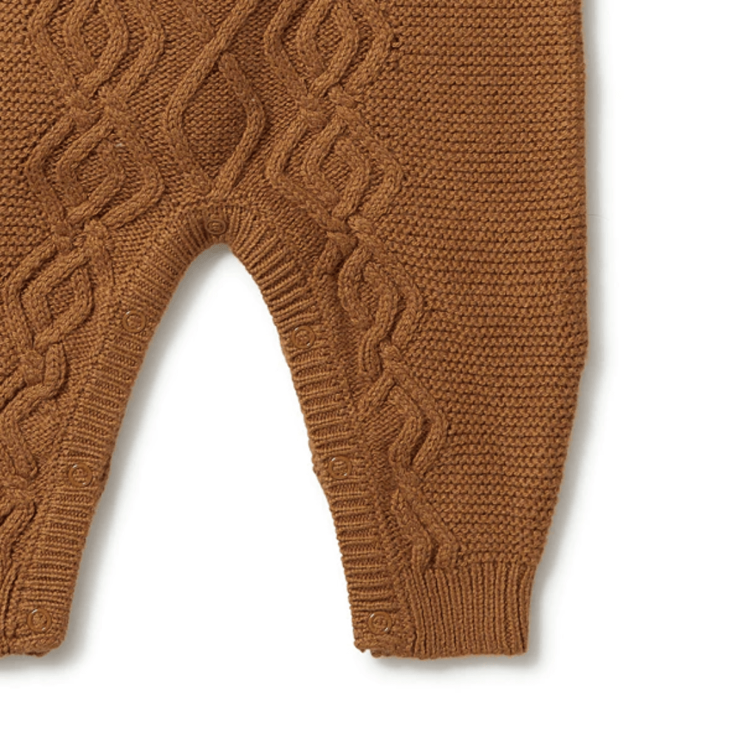 Close-Up-Of-Wilson-And-Frenchy-Knitted-Cable-Growsuit-Spice-Naked-Baby-Eco-Boutique