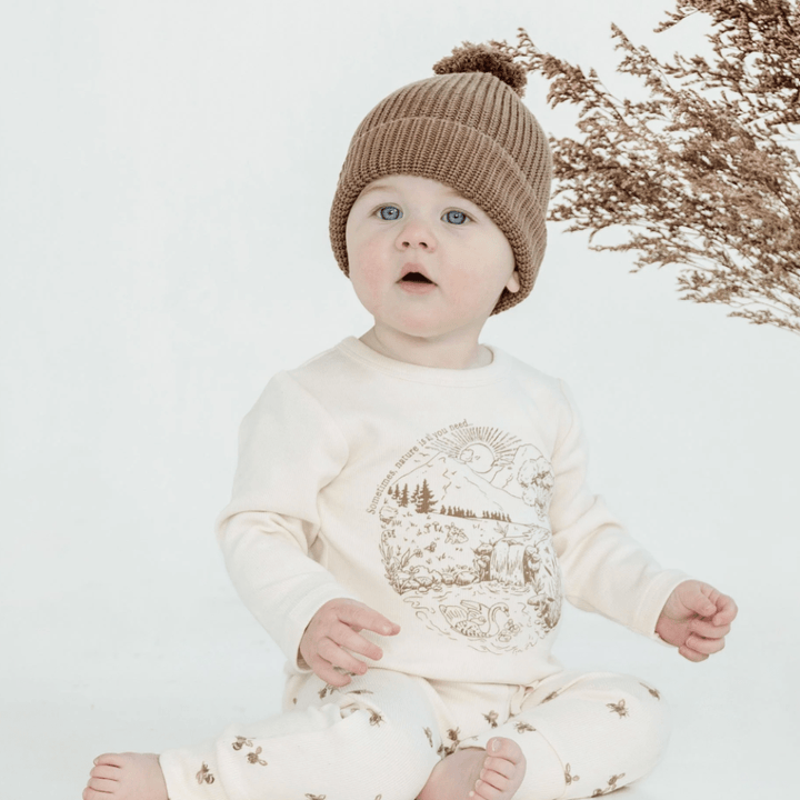 Close-up-of-Baby-Sitting-Wearing-Aster-and-Oak-Organic-Cotton-Long-Sleeve-Top-Naked-Baby-Eco-Boutique