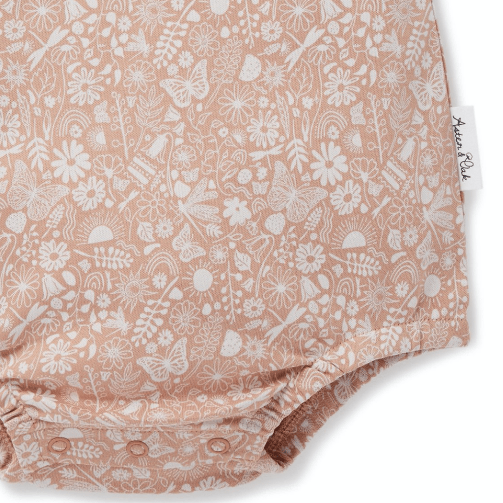Close-up-of-Bottom-of-Aster-and-Oak-Ditzy-Floral-Bubble-Romper-Naked-Baby-Eco-Boutique