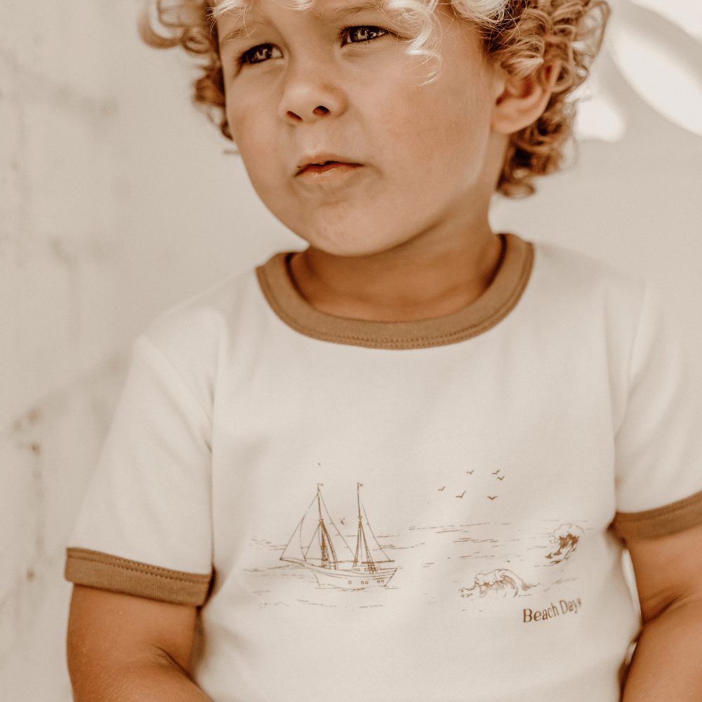 Close-up-of-Little-Boy-Wearing-Aster-and-Oak-Organic-Ringer-Tee-Naked-Baby-Eco-Boutique