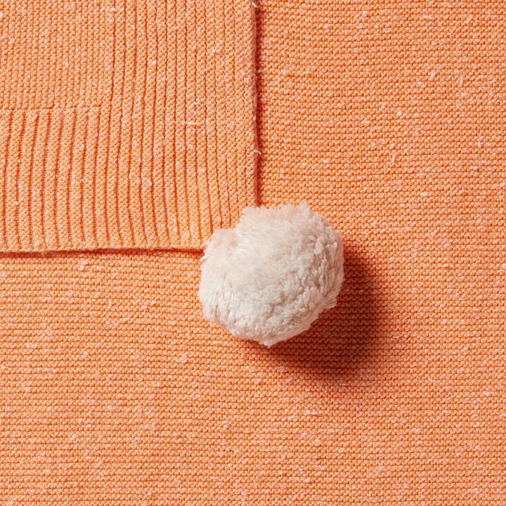 Close-up-of-Wilson-and-Frenchy-Knitted-Baby-Blanket-Apricot-Fleck-Naked-Baby-Eco-Boutique