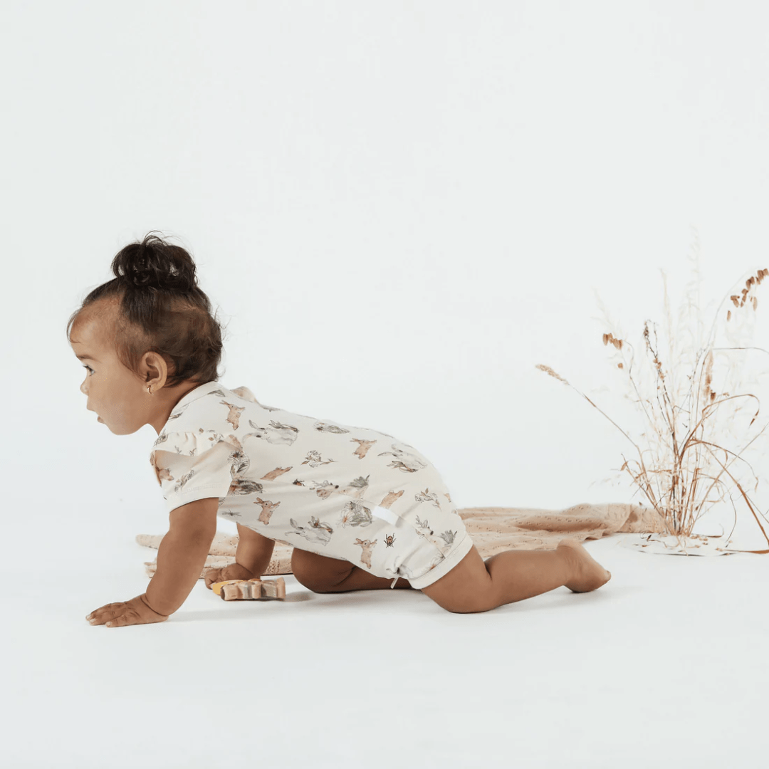Crawling-Baby-Wearing-Aster-And-Oak-Organic-Cotton-Flutter-Sleeve_zip-Romper-Prairie-Naked-Baby-Eco-Boutique