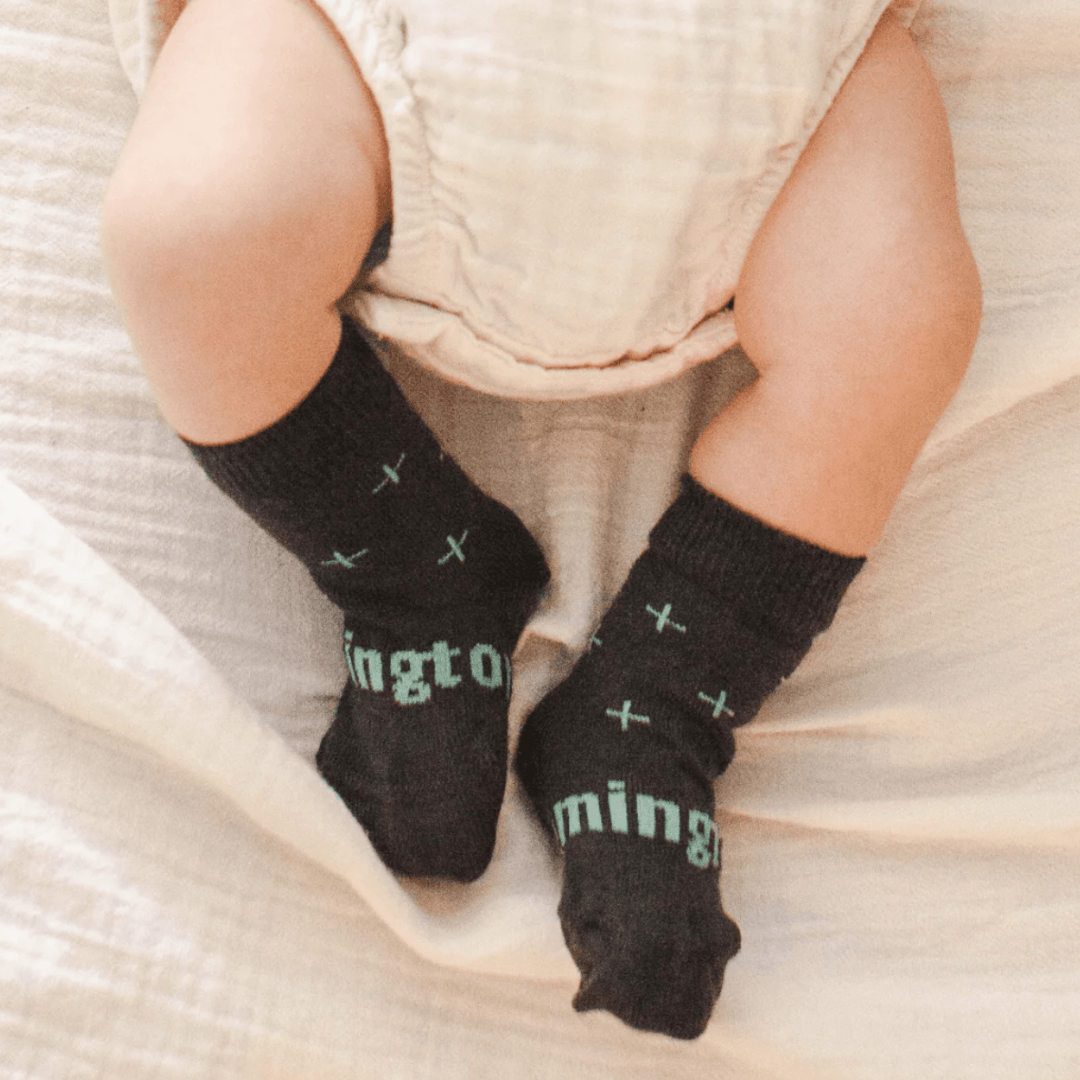 Cute-Baby-Legs-Wearing-Lamington-Merino-Wool-Crew-Baby-Socks-Cactus-Naked-Baby-Eco-Boutique