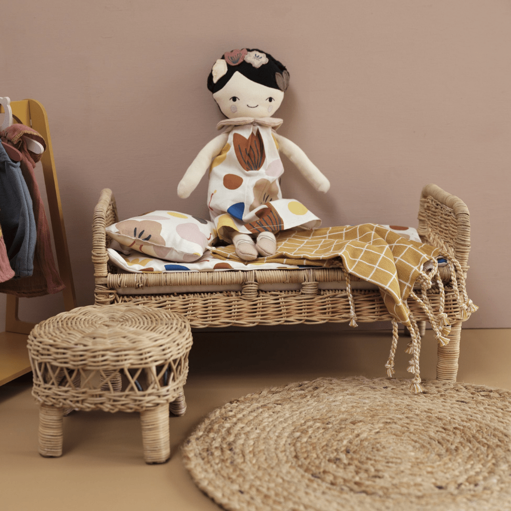 Doll-Sitting-on-Bed-Made-with-Fabelab-Organic-Cotton-Doll-Bedding-Mattress-Set-Mix-Naked-Baby-Eco-Boutique