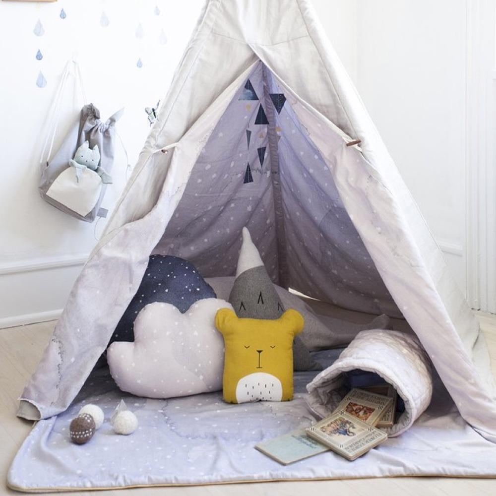 A teepee in a child's room with Fabelab Organic Cotton Animal Cushions - LUCKY LAST - BEAR (HONEY) and stuffed animals.