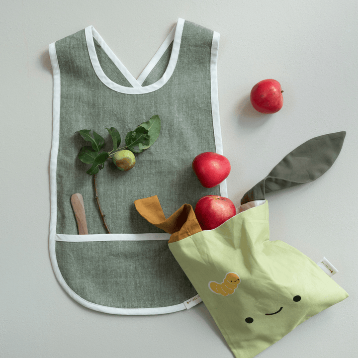 Fabelab-Organic-Cotton-Cross-Back-Bib-Olive-with-Snacks-in-Pocket-Naked-Baby-Eco-Boutique