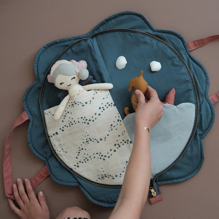 A person holding a Fabelab Organic Cotton Play Purse in the shape of a stuffed animal.
