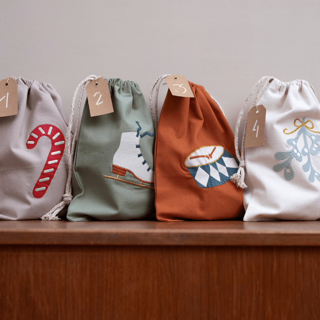 Fabelab-Organic-Cotton-Reusable-Gift-Bags-Lined-Up-Naked-Baby-Eco-Boutique