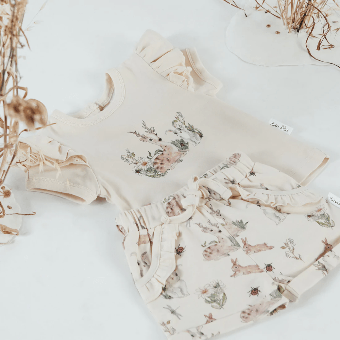 Flatlay-Of-Aster-And-Oak-Organic-Cotton-Prairie-Print-Flutter-Tee-Naked-Baby-Eco-Boutique