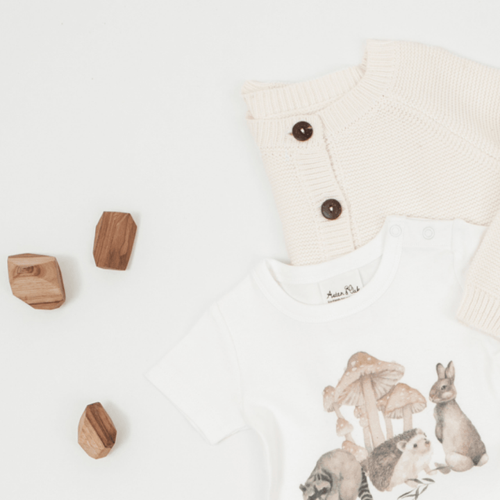Flatlay-Of-Aster-And-Oak-Organic-Cotton-Woodland-Print-Tee-Naked-Baby-Eco-Boutique