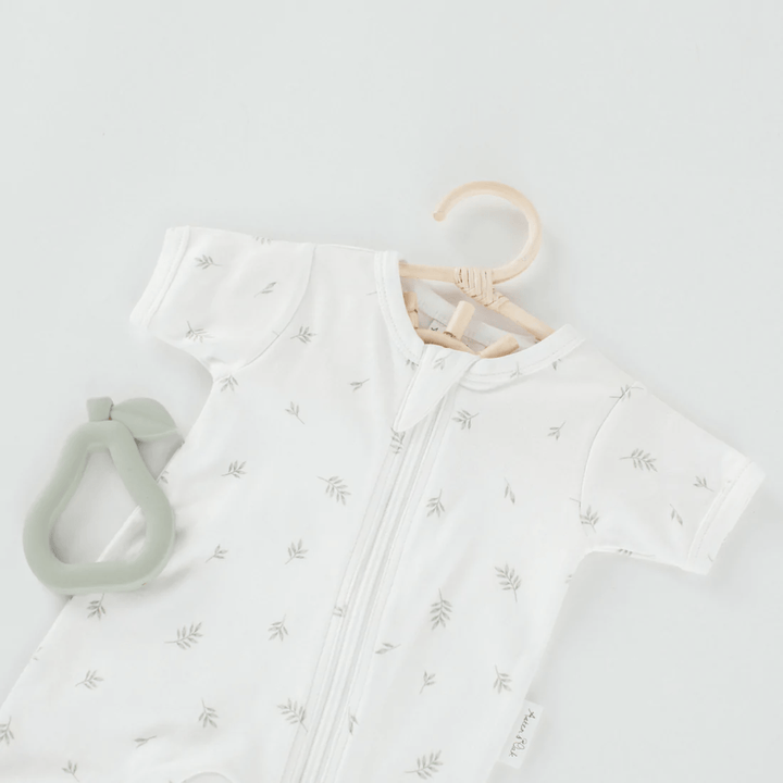 Flatlay-Of-Aster-And-Oak-Organic-Cotton-Zip-Romper-Little-Leaf-Naked-Baby-Eco-Boutique