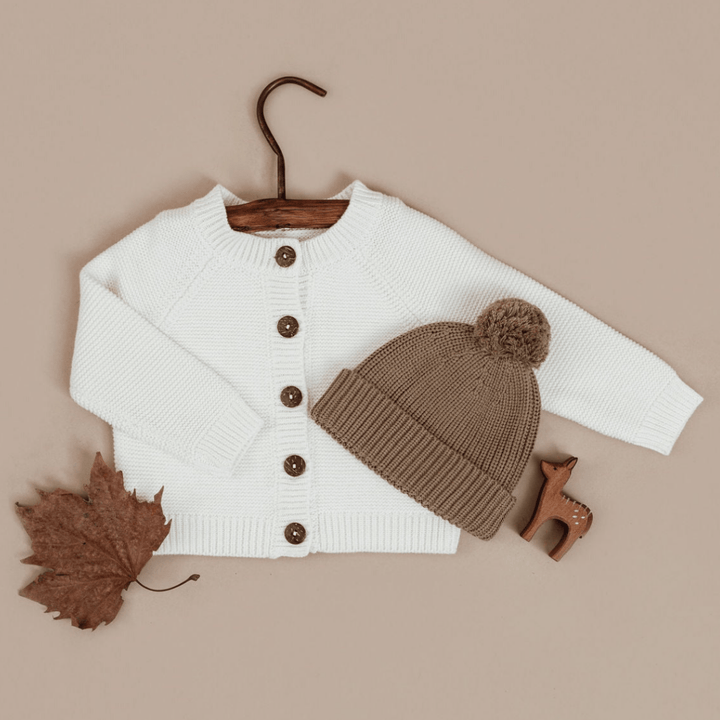 Flatlay-With-Leaves-And-Aster-And-Oak-Organic-Chunky-Knit-Cardigan-Off-White-Naked-Baby-Eco-Boutique