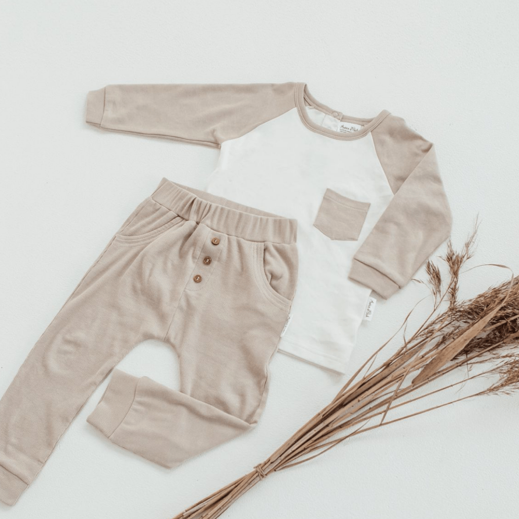 Flatlay-of-Aster-and-Oak-Organic-Raglan-Pocket-Tee-Naked-Baby-Eco-Boutique